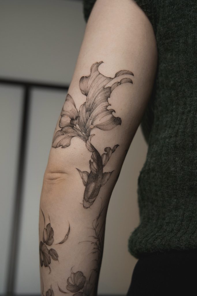 finelinefiskfemininoslotattoo