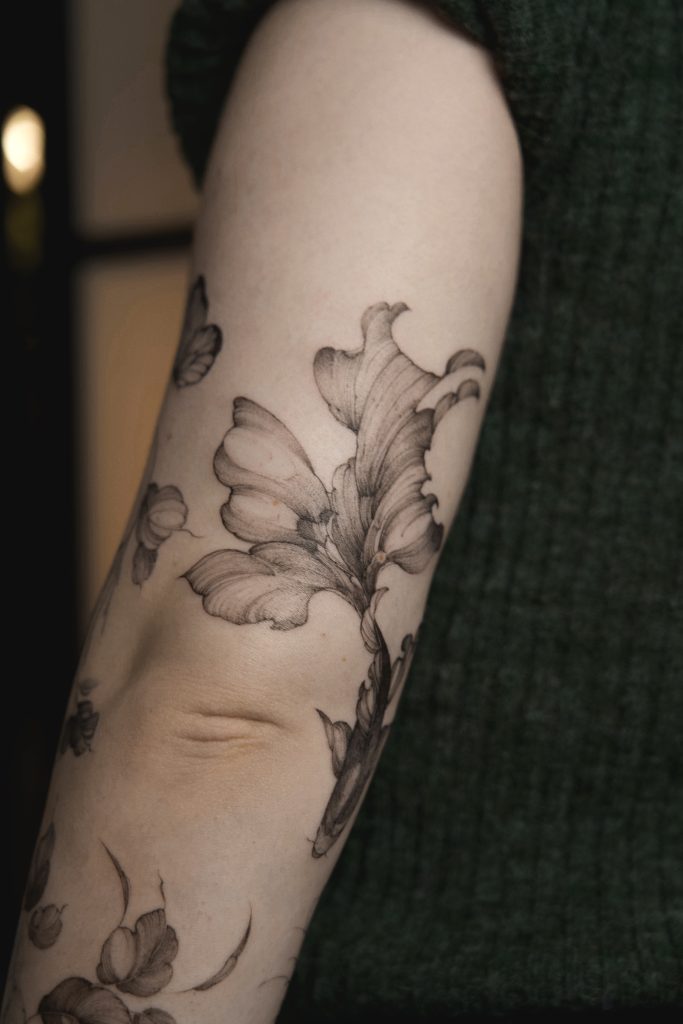 finelinefiskfemininoslotattoo